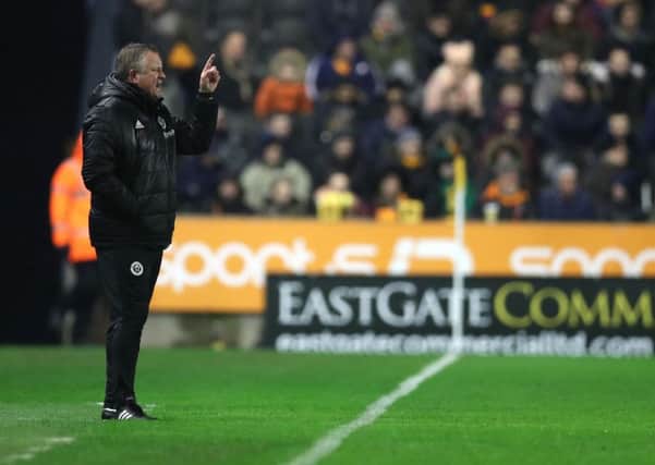 Sheffield United manager Chris Wilder points the way