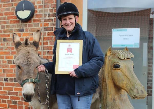 Visitor Centre Team Leader, Louise Wass with Donkey Bluey.