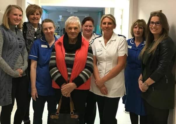 The family of Michael Hargreaves pictured with Bassetlaw Hospital ICU staff.