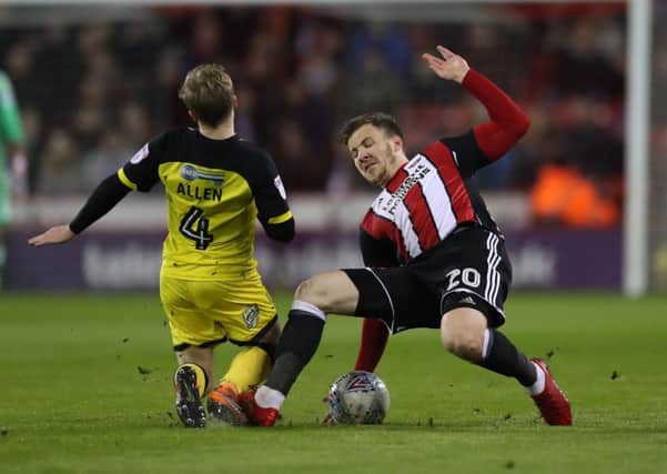Lee Evans says Sheffield United's players are prepared to work hard for each other: Simon Bellis/Sportimage