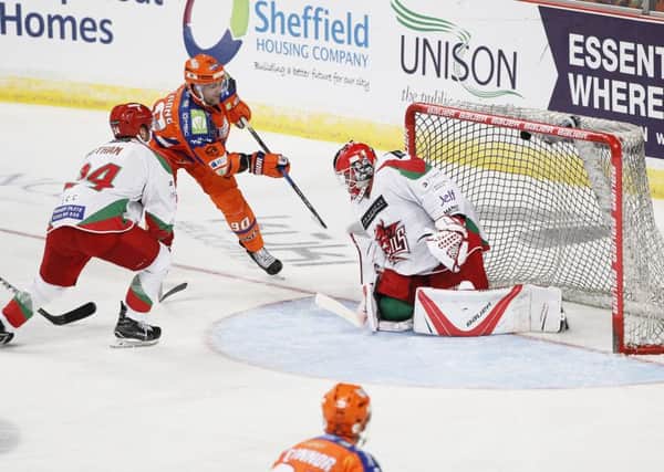 John Armstrong roofs the puck against Cardiff Devils, last October