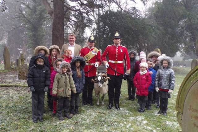 Ramsden Primary School pupils with the ram mascot of the Mercian Regiment, Private Derby.