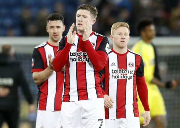 Sheffield United's John Lundstram still believes reaching the play-offs is possible