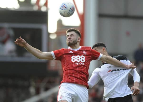 Young prospect Ben Brereton, pictured winning a header against Derby County at the City Ground, has made 35 appearances for the Reds this season, scoring four goals, in a campaign which has seen him play largely wide right