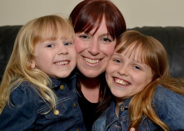 Budding actor, Emily Askew, nine pictured right with Mum Katie and sister Isabelle