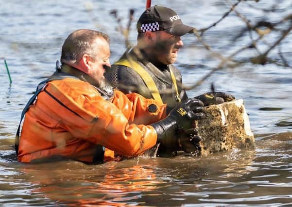 Nottinghamshire Police divers used a training exercise to assist Clumber Park in the recovery of stone sections of the ornamental bridge. Photo: Steve Bradley/National Trust.
