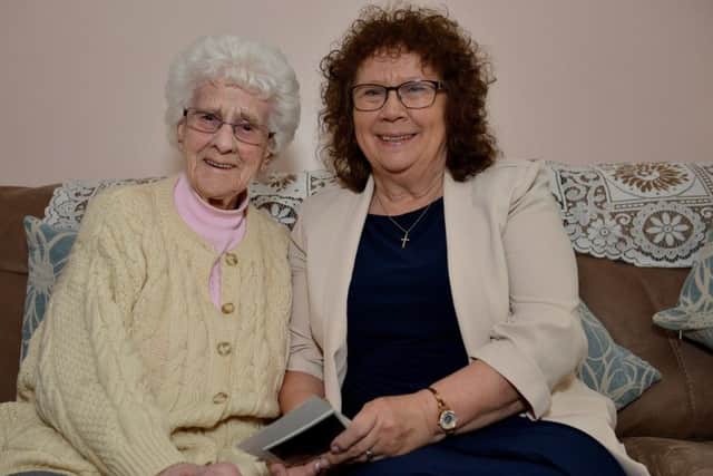 Bassetlaw District Council Chairman Madelaine Richardson reminiscing with her Great Aunt 100 year old Dot Finch
