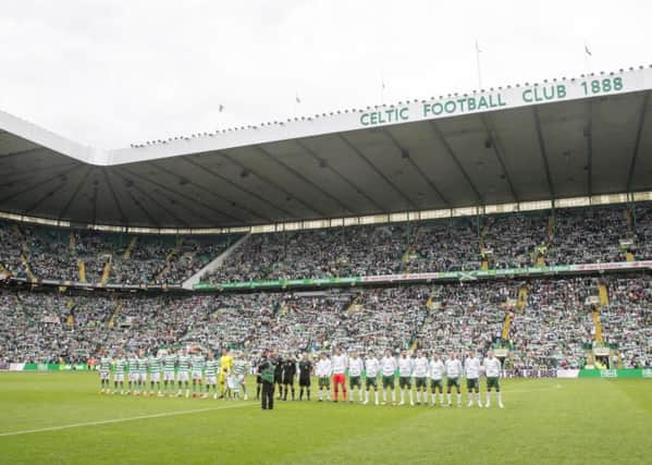 Celtic and Republic of Ireland players line up during the testimonial match at Celtic Park: Jeff Holmes/PA Wire.