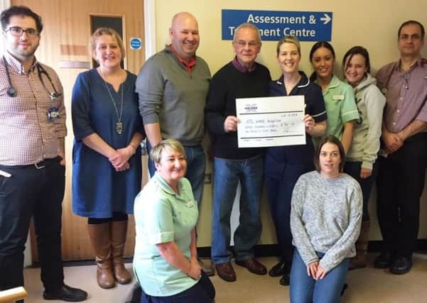 The family of Eileen Brown pay a visit to Bassetlaw Hospital with a Â£1,500 donation.