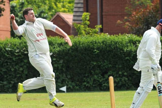 Andy Stoneman bowls for Worksop.