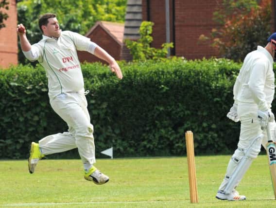 Andy Stoneman bowls for Worksop.